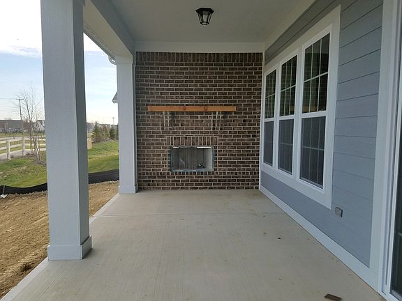 Covered Porch with Wood Burning Fireplace
