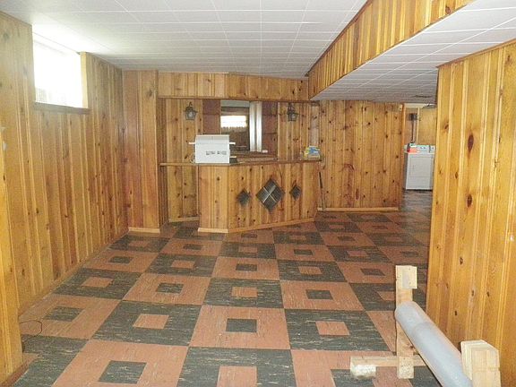 Rec Room with Bar and Knotty Pine Paneling