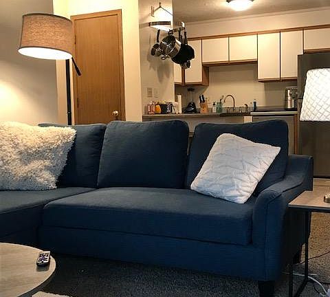 Spacious Living Room Open to Kitchen with Counter Height Bar Area