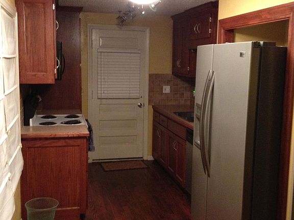 Kitchen (door goes out to side yard and back yard)