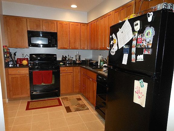 updated kitchen with granite, newer cabinets and undercabine