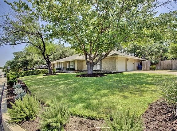 Great curb appeal on a large corner lot, side entry garage.