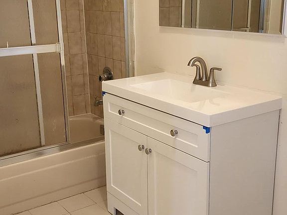 Neat , clean & spacious full bathroom.