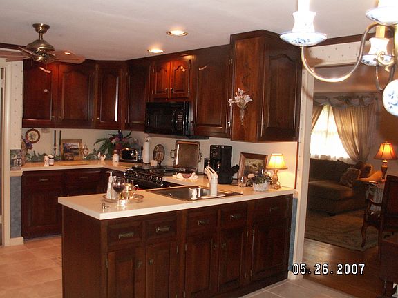 kitchen: solid maple cabinets, new tile floor