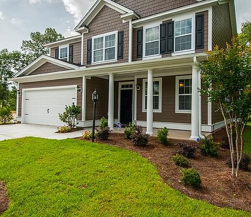 Photos are of a similar home
