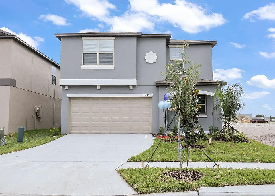 Welcome to your brand new home in Saddle Creek Preserve located in Lakeland FL