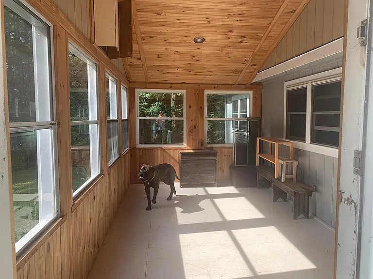 Enclosed front porch (dog not included).