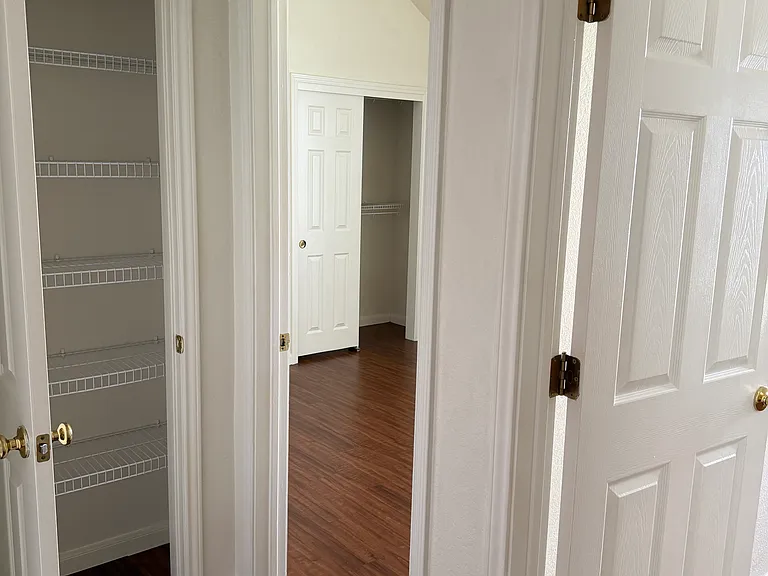 Hall closet by bedrooms 2 and 3