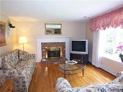 Formal living room with gas fireplace
