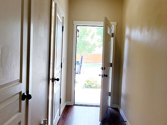 Entryway, garage access and extra closet