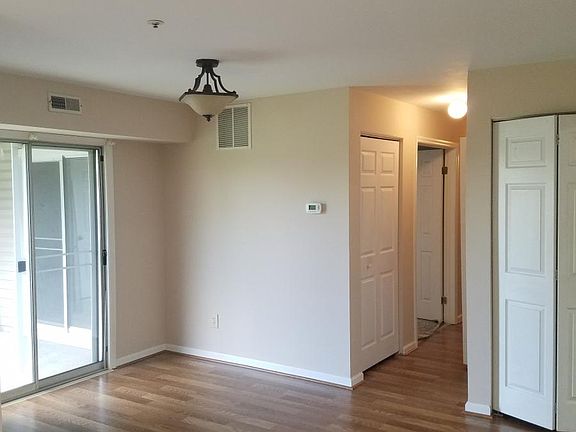 Dining Room w Sliders to Patio