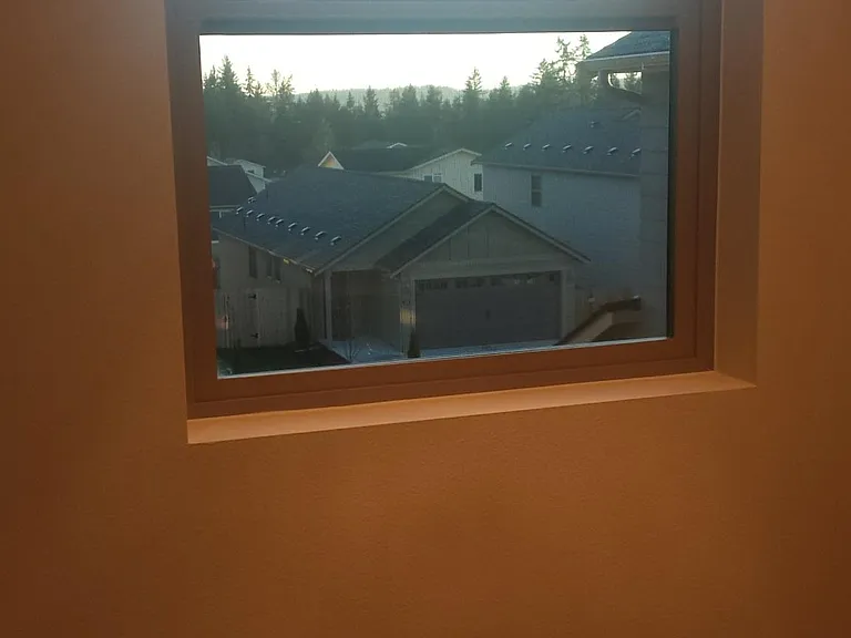 Window, toilet in secondary upstairs bathroom