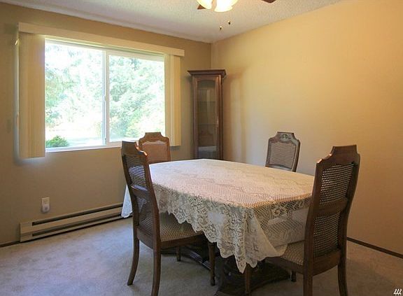 The dining room is just off the kitchen, a perfect place for serving up dinner.