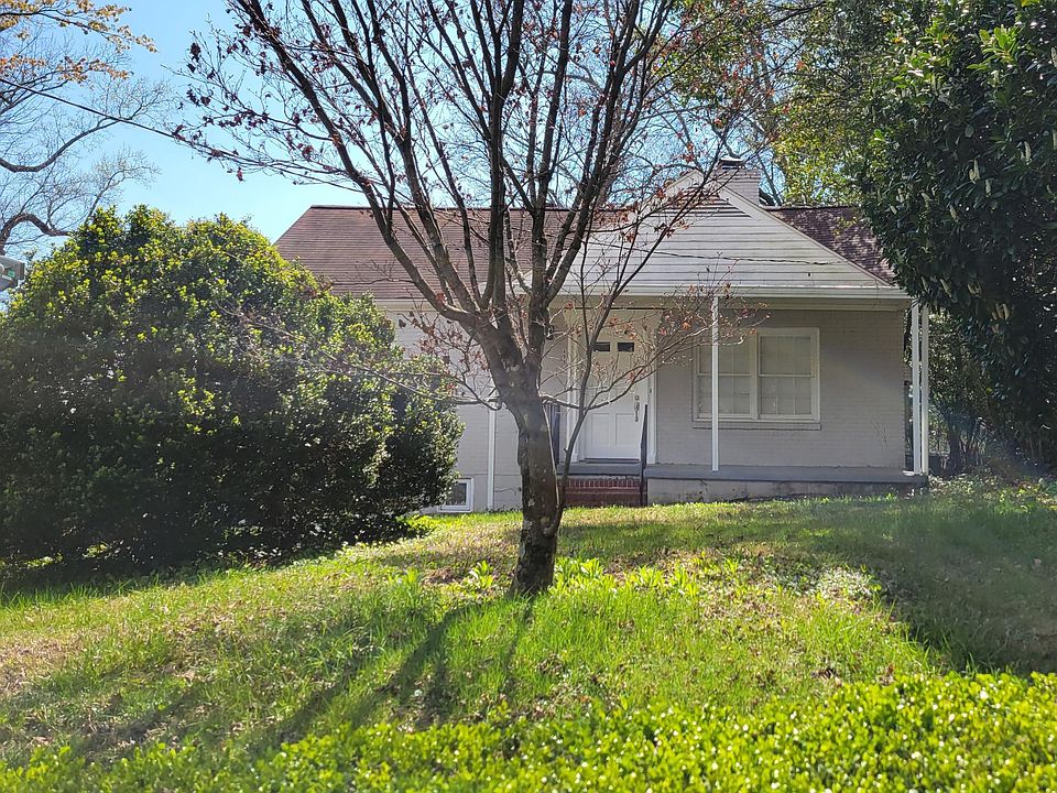 Cute intown bungalow with sunny yard in cozy neighborhood.