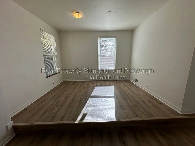 208 Rolfe St — Photo 5