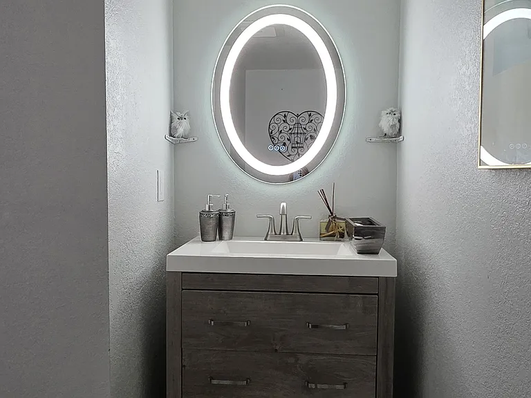 Downstairs Half Bath with Vanity Mirror