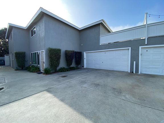 Attached double car garage and front of unit