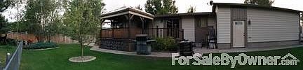 Back Yard
						:
						Back yard with deck and stone walkway.