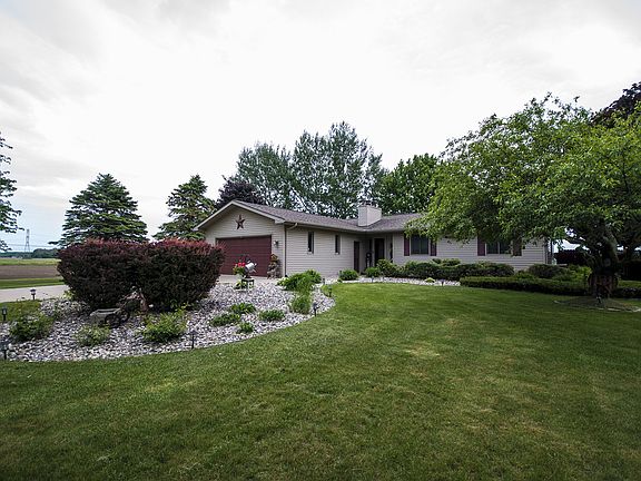 Look at this beautiful yard that has been professionally landscaped and is easy to maintain.  This home was built in 1980 in the highly desired Bullock Creek school district and is nestled in Ingersoll Township on almost an acre.  Quiet country lot close and conveniently located to all the amenities both Freeland and Midland have to offer. 