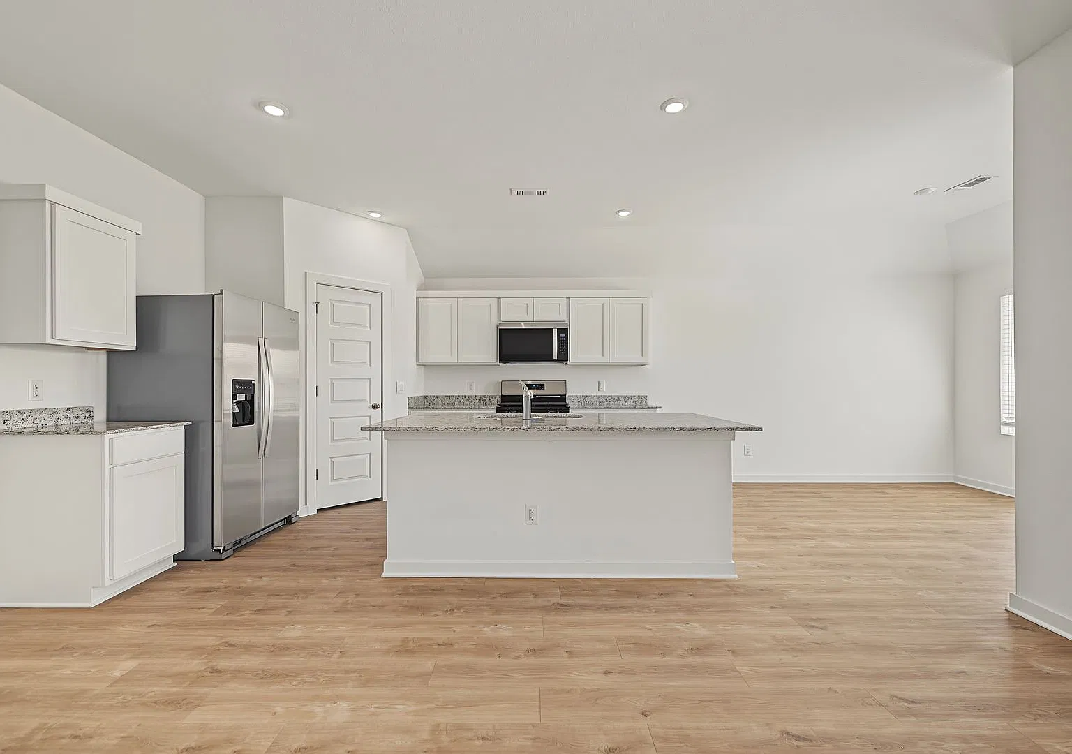 Light-Filled 4-Bedroom Home with Open Floor Plan — Photo 3