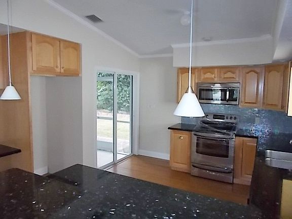 4th image of 167 N Coconut Palm Blvd