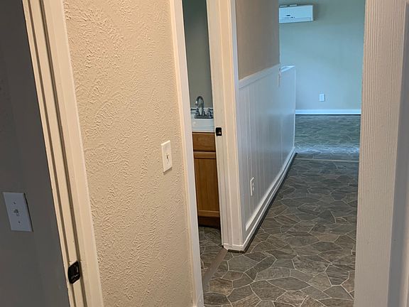 Hall to bathroom and bedroom