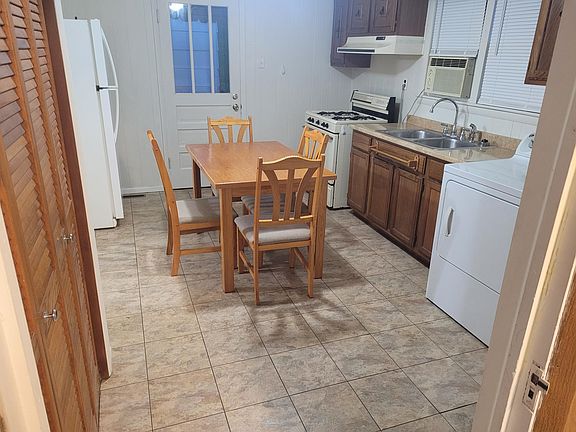 Picture of Kitchen area. Kitchen table is included as part of the rental.