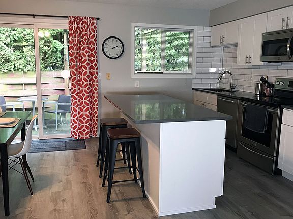 Kitchen and dining area, with private patio area in back