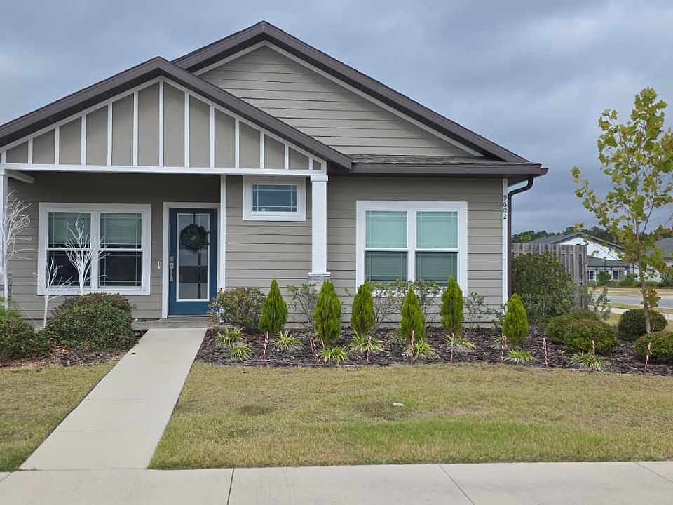 Front of the house with a big front yard