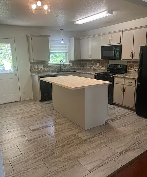 Kitchen, island, & dining