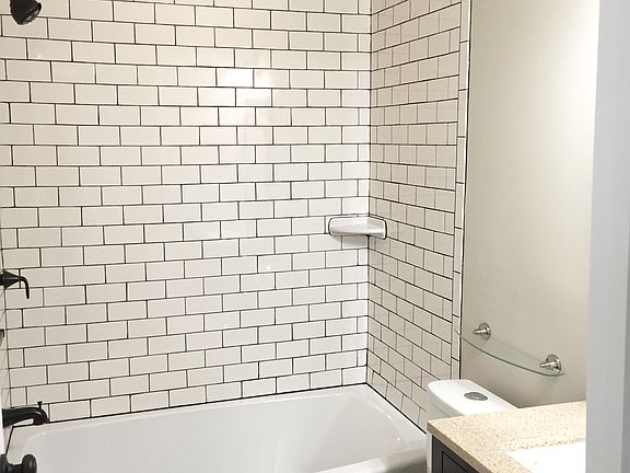 Newly-updated master bathroom with subway tile