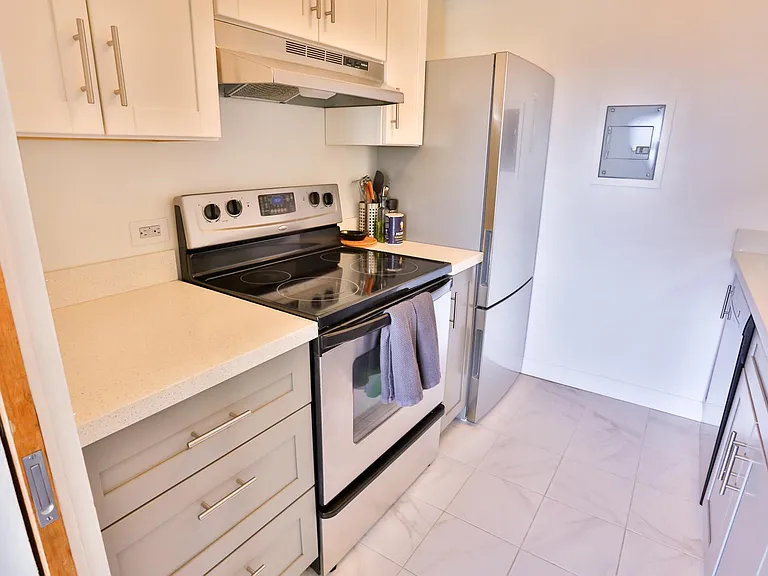 Upgraded cabinets, counters, and appliances.