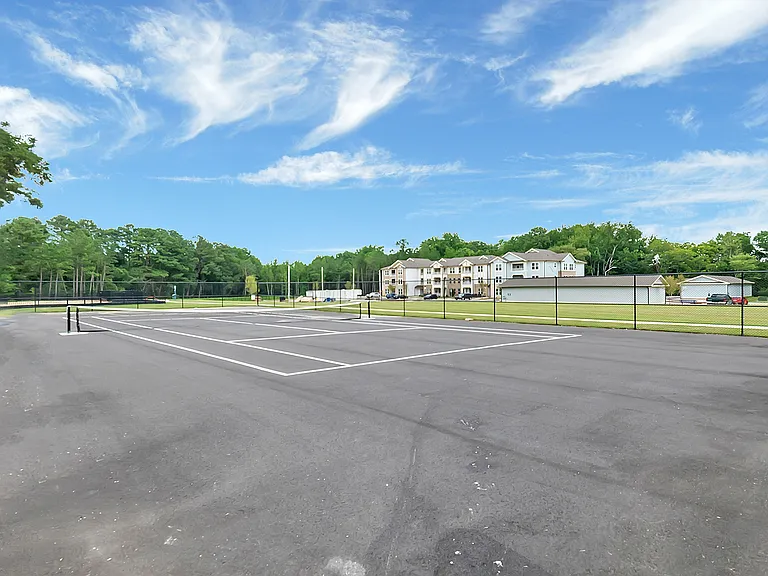Tennis and pickleball court on-site for year-round enjoyment