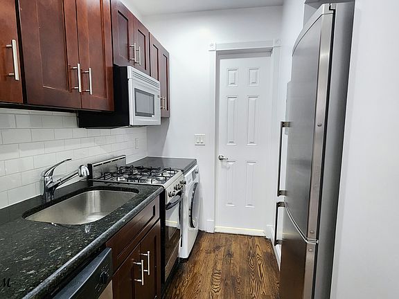 5th image of 309 Mott St APT 4A
