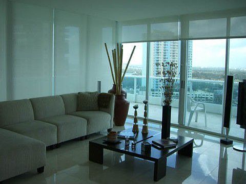 Living Room with motorized window treatments