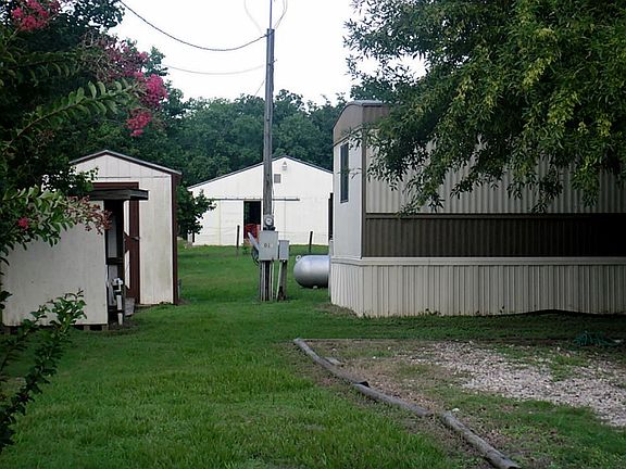 This portion of land is 1.25 acres combined with vacant lot to left. ( Next Picture)