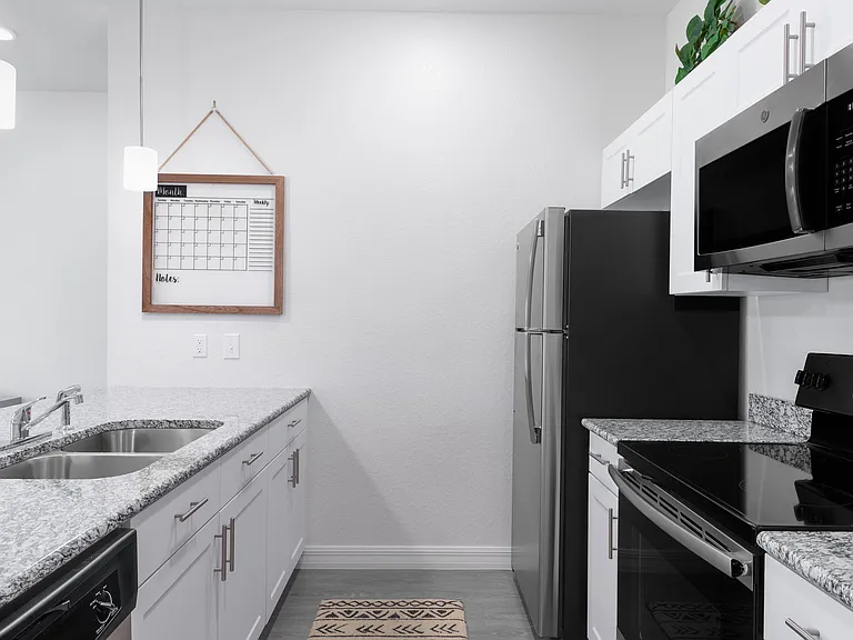Explore this sleek and stylish kitchen designed for both function and elegance.