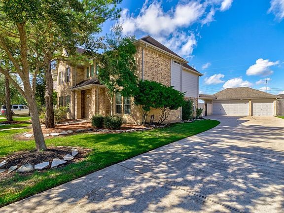 You'll appreciate the convenience of having an extra long drive way and a 3 car detached garage.