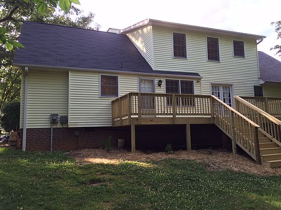 Back of home, side, new deck