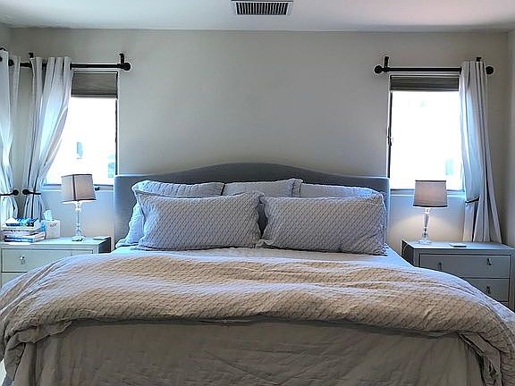 Master bedroom king size with custom linene