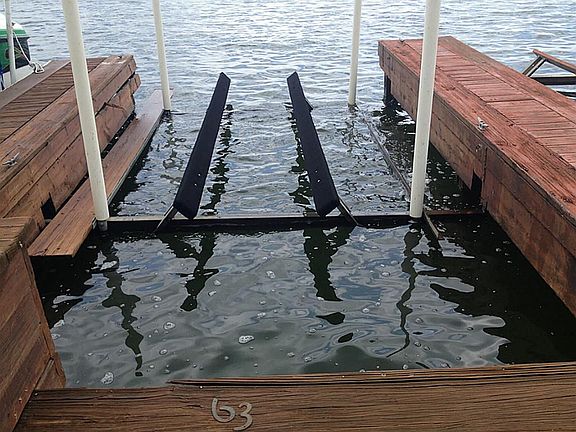 This is one of two boat slips with a storage lock box at the front.