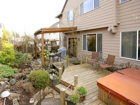 Back yard with built-in hot tub
