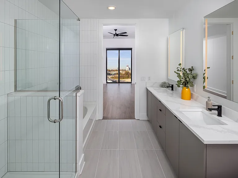 Dual showers and soaking tubs in select floorplans