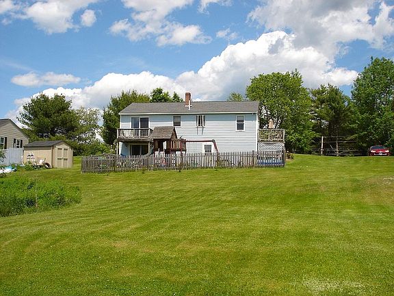 Large backyard on this 1 acre lot