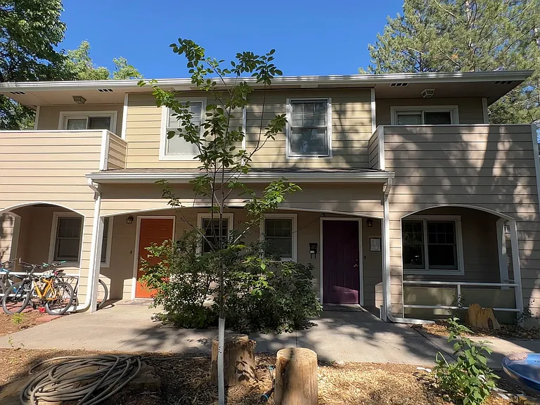 Welcome to Remington Place Townhomes - two-story living with private entrances and reserved parking.