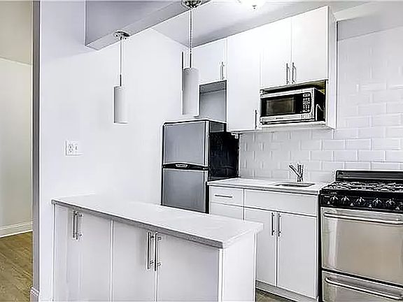 3rd image of 160 E 3rd St APT 2H