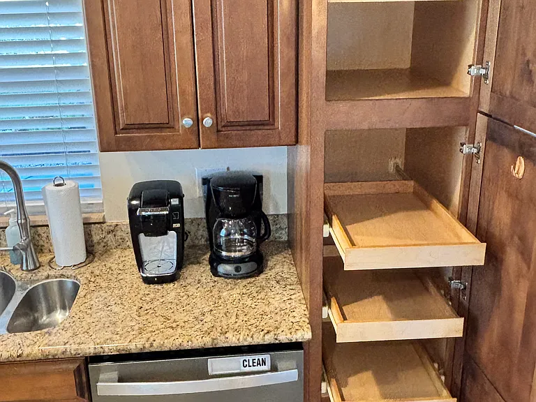 Plenty of storage cabinets and pull-out shelves