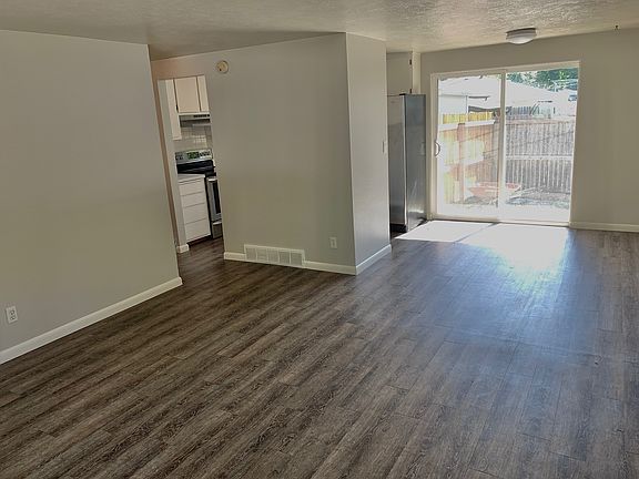 Living area looking into dining room.