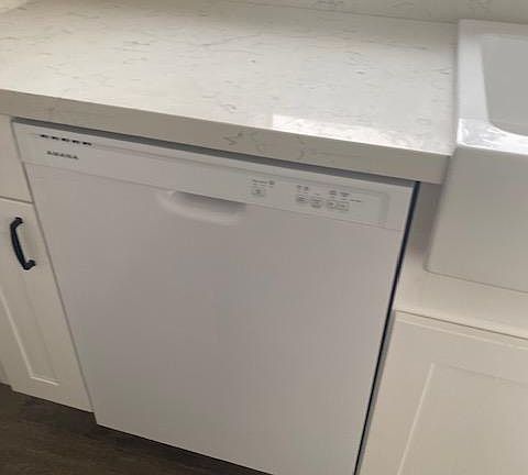 New dishwasher with garbage disposal.