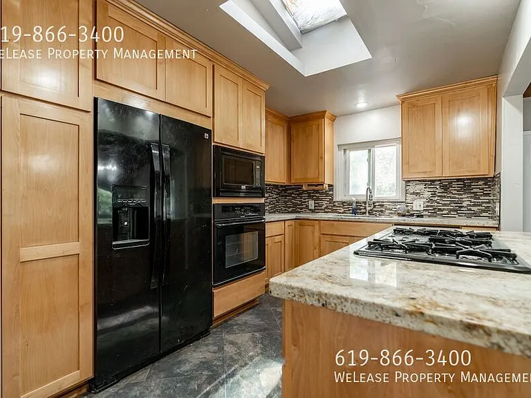 9316 Marilla Dr — Photo 2